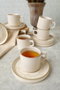 Hermia Juego de tazas de té y platillos de 12 piezas color crema